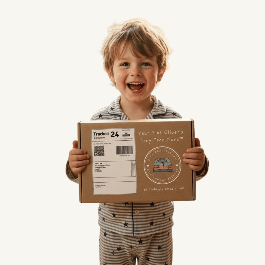 Smiling child in star pyjamas holding a Tiny Traditions box — Year 3 of Oliver's Tiny Traditions, Royal Mail label, seal and birthdaypyjamas.co.uk