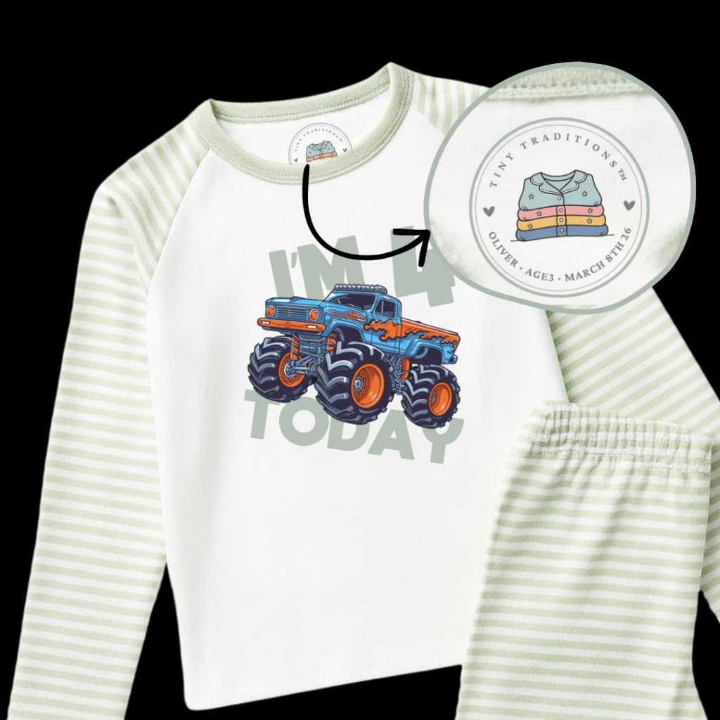 Personalised children’s pyjama set with monster truck graphic and magnified circular Tiny Traditions neck label